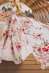 Vestido largo acampanado con cintura anudada y estampado bohemio