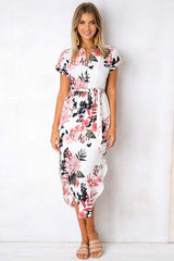 Vestido midi con estampado floral y cuello abierto