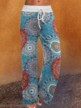 Pantalones bohemios azules de mezcla de algodón con estampado Paisley