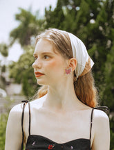 Pendientes de mariposa morados