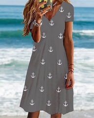 Vestidos skater ajustados con cuello ondulado y manga corta estampados