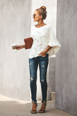 Suéter de punto extragrande con mangas de murciélago y pétalos