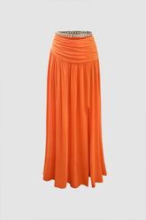 Falda larga con abertura y cadena gruesa