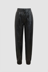 Pantalones con dobladillo efecto cocodrilo