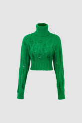 Suéter de punto trenzado destruido