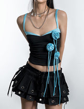 Chaleco plisado con escote en V y flores en colores contrastantes