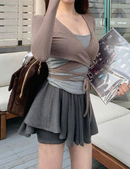 Conjunto de camiseta de manga larga con lazo retro y falda de cintura alta