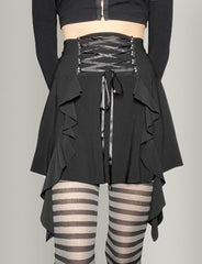 Minifalda plisada de ballet negra con cordones y ribete de volantes