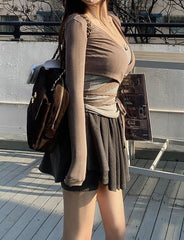 Conjunto de camiseta de manga larga con lazo retro y falda de cintura alta