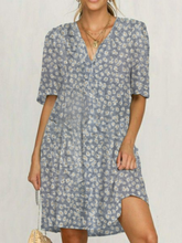 Vestidos casuales de manga corta con margaritas de talla grande