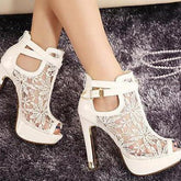 Sandalias de plataforma con tacón alto y malla y punta abierta