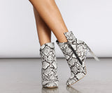 Come Thru Snake Print Clear Heeled Booties