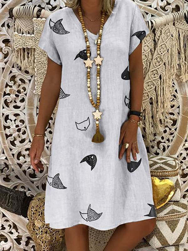 Printed v-neck short sleeved medium length shift dresses